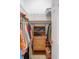 Walk-in closet with built-in shelving, hanging racks, and storage solutions at 3696 Peacepipe Ct, Clermont, FL 34711