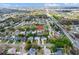 Aerial view of the property with nearby street and lake in the distance at 413 Country Wood Cir, Lake Mary, FL 32746
