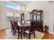 Elegant dining room with a large table, chairs, and decorative hutch at 413 Country Wood Cir, Lake Mary, FL 32746