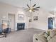 Spacious living room with a fireplace and plush carpeting at 413 Country Wood Cir, Lake Mary, FL 32746