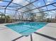 A private screened-in pool has steps for entry, with a clear blue sky above at 413 Country Wood Cir, Lake Mary, FL 32746