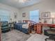 Cozy bedroom featuring a daybed, desk, and ample natural light at 500 E Crystal Lake St, Orlando, FL 32806