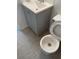 Cozy bathroom with neutral finishes and tile flooring next to the toilet at 5317 Curry Ford Rd # Q104, Orlando, FL 32812