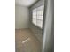Bright and airy bedroom featuring a large window with natural light at 5317 Curry Ford Rd # Q104, Orlando, FL 32812