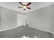 The bedroom features modern flooring, closet and ceiling fan at 5325 Glasgow Ave, Orlando, FL 32819