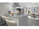 Contemporary kitchen featuring a breakfast bar and stainless steel appliances at 5325 Glasgow Ave, Orlando, FL 32819