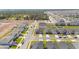 An overhead shot showcasing the community's layout, new homes, and convenient access to nearby amenities at 5996 Wildflower Field Way, St Cloud, FL 34771
