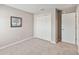 Bright bedroom with a closet and neutral carpet flooring at 5996 Wildflower Field Way, St Cloud, FL 34771