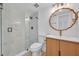 Updated bathroom with a glass shower door, mosaic tile, and a vessel sink at 6373 Forecastle Ct, Orlando, FL 32807