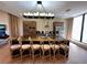 Spacious kitchen island with pendant lighting and modern cabinetry at 7534 Brooklyn Dr, Kissimmee, FL 34747