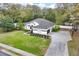 Aerial view showcasing the home's landscaping, private yard, and curb appeal at 8176 Emerald Forest Ct, Sanford, FL 32771