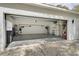 Spacious garage with plenty of storage space, epoxy flooring, and good lighting at 8176 Emerald Forest Ct, Sanford, FL 32771