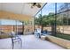 This patio has an outdoor ceiling fan, is fully screened, and is covered at 835 Longleaf Pine Ct, Orlando, FL 32825