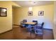 Dining room with yellow walls and wood flooring at 8837 Latrec Ave # 5307, Orlando, FL 32819