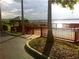 Charming gazebo and fishing pier creating an outdoor retreat for relaxation and nature enjoyment at 8837 Latrec Ave # 5307, Orlando, FL 32819