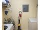 Functional laundry room with washer, dryer, and storage shelves at 8837 Latrec Ave # 5307, Orlando, FL 32819