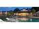 Beautiful community pool with lounge chairs and well-maintained grounds at 8837 Latrec Ave # 5307, Orlando, FL 32819