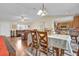 Open-concept dining area connected to the living room and kitchen, great for entertaining at 96 Pecan Dr, Ocala, FL 34472