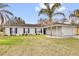 Inviting single-story home with well-maintained landscaping and a cozy front entrance at 96 Pecan Dr, Ocala, FL 34472