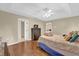 Comfortable main bedroom with ample space and modern ceiling fan at 96 Pecan Dr, Ocala, FL 34472