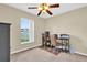 Bedroom staged as office with a view to the exterior at 96 Pecan Dr, Ocala, FL 34472