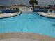 Outdoor swimming pool with clear blue water for exercise and relaxation at 361 Wade Park Ct, Davenport, FL 33897