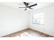 A vacant bedroom with wood-look flooring and a ceiling fan at 1203 Baranova Rd, Ocoee, FL 34761