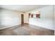 Open living room showcasing a view of the kitchen with dark wood cabinets at 1205 Flewelling Ave, Ocoee, FL 34761