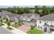 An aerial view of a neighborhood featuring well-maintained homes and landscaping at 1212 Bear Oak Ln, Deland, FL 32720