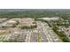 Aerial view of a residential neighborhood with homes, streets, and green spaces at 1212 Bear Oak Ln, Deland, FL 32720