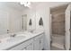Spacious bathroom features double sinks, quartz countertops, and a tub/shower combo at 1212 Bear Oak Ln, Deland, FL 32720