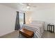 Bedroom with a ceiling fan, natural light, and simple furnishings at 1212 Bear Oak Ln, Deland, FL 32720