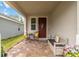 Cozy front porch with a seating area at 1212 Bear Oak Ln, Deland, FL 32720