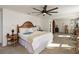 Sunlit main bedroom features large windows, ceiling fan and ample space for relaxation at 1212 Bear Oak Ln, Deland, FL 32720