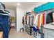 Bright walk-in closet features ample shelving and hanging space for optimal organization at 1212 Bear Oak Ln, Deland, FL 32720