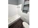 The bathroom features a white bathtub at 1219 Dewey Ave, Orlando, FL 32808