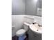 A bathroom with a tile surround and a single sink vanity at 1219 Dewey Ave, Orlando, FL 32808