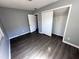 The bedrooms features new floors and fresh paint at 1219 Dewey Ave, Orlando, FL 32808