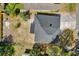 An aerial view of a house showcasing the roof, backyard, and driveway at 1240 Moton Ave, Sanford, FL 32771