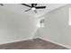 Clean bedroom features a ceiling fan, wood-look flooring, and natural light at 1240 Moton Ave, Sanford, FL 32771