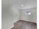 Clean room features gray walls, wood-look flooring, and natural light at 1240 Moton Ave, Sanford, FL 32771