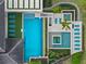 Aerial view showcasing a pool, lounge chairs, landscaping, and outdoor spaces, perfect for enjoying the outdoors at 1297 Grand Traverse Pkwy, Reunion, FL 34747