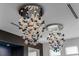 Close-up of the two modern globe-style chandeliers in a large conference room at 1297 Grand Traverse Pkwy, Reunion, FL 34747