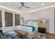 Serene main bedroom with recessed lighting, window coverings, and stylish decor at 1297 Grand Traverse Pkwy, Reunion, FL 34747