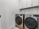 Laundry room featuring side by side washer and dryer at 1344 Blue Stem Lane, Winter Park, FL 32792