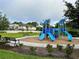 Community playground with slides and climbing structures, perfect for outdoor activities and fun at 1344 Blue Stem Lane, Winter Park, FL 32792