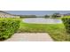 The home features a beautiful green backyard with a great lake view at 13441 Starry Night Ct # 9, Orlando, FL 32824