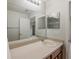 Bathroom with vanity, sink, and large mirror at 13441 Starry Night Ct # 9, Orlando, FL 32824