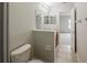 Bathroom with toilet, vanity, and large mirror at 13441 Starry Night Ct # 9, Orlando, FL 32824