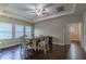 Recreational room with a ceiling fan and a wooden table, perfect for entertainment at 14031 Jomatt Loop, Winter Garden, FL 34787